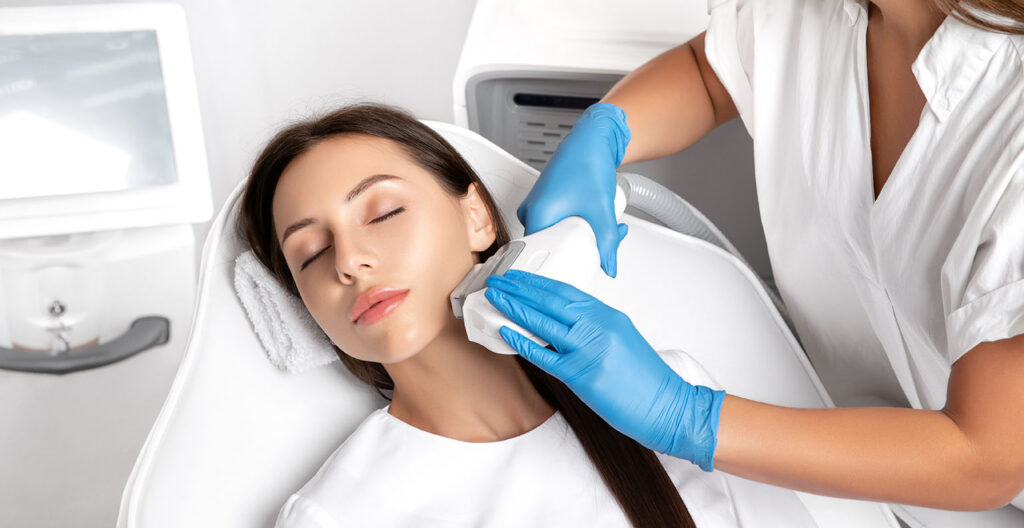 Patient receiving IPL photofacial treatment to address pigmentation, redness, and uneven skin tone.